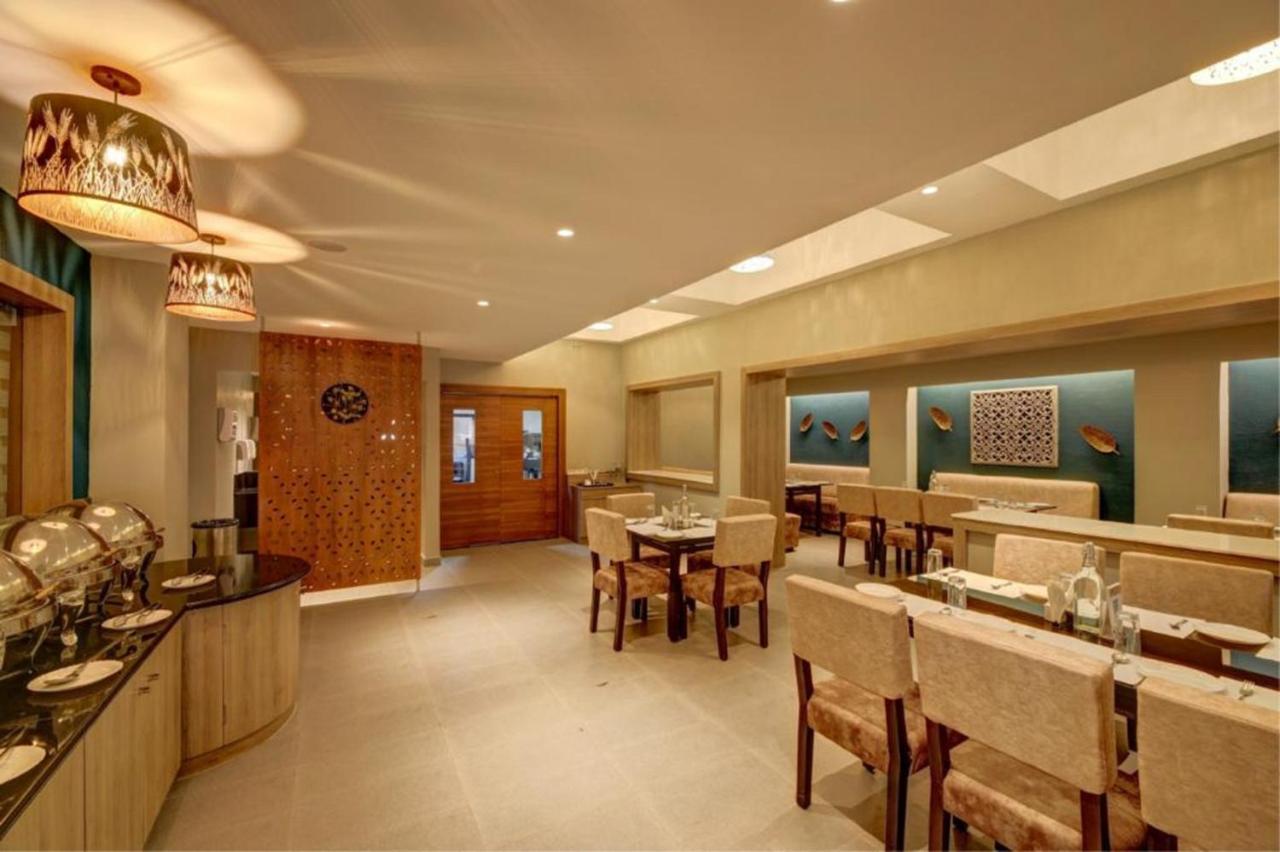 Ima House Hotel Kochi Bagian luar foto