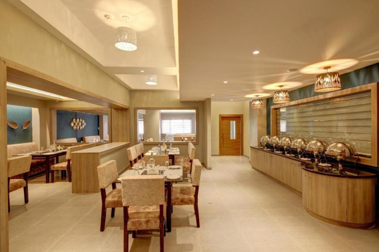 Ima House Hotel Kochi Bagian luar foto