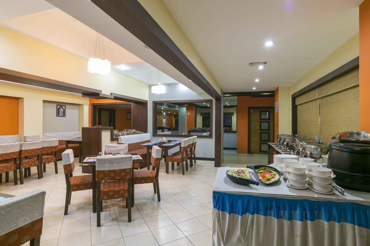Ima House Hotel Kochi Bagian luar foto